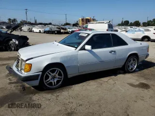 1990 Mercedes-Benz 300 with VIN WDBEA51D0LB167029, listed as a Copart auction lot 68581534 with 184,595 mi miles and Salvage Title. Bid and sale history available at carsss.com. Image 1.