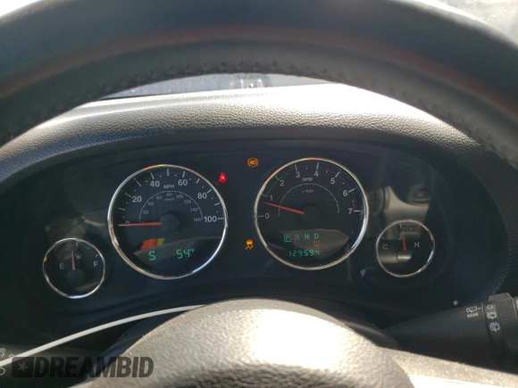 2013 Jeep Wrangler Sahara with VIN 1C4AJWBG3DL516842, listed as a Copart auction lot 49246065 with 129,594 mi miles and Salvage title. Bid and sale history available at DreamBid. Image 9.
