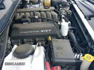 2017 Dodge Challenger 392 Hemi Scat Pack Shaker z VIN 2C3CDZFJXHH578379, wystawiony jako IAAI lot #42230835 z przebiegiem 100 855 mil mil oraz . Historia ofert i sprzedaży dostępna na DreamBid. Obrazek 19.