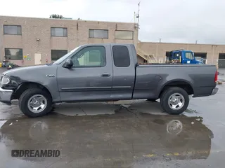 2003 Ford F-150 XL with VIN 1FTRX17W03NB51687, listed as a IAAI auction lot 41712022 with 183,428 mi miles. Bid and sale history available at carsss.com. Image 14.