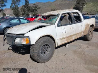 2001 Ford F-150 SuperCrew XLT with VIN 1FTRW07L91KC59856, listed as a IAAI auction lot 41615565 with 1 mi miles. Bid and sale history available at carsss.com. Image 2.