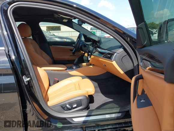 2019 BMW 5 Series 530i with VIN WBAJA5C50KWW02304, listed as a IAAI auction lot 42338536 with 29,049 mi miles and . Bid and sale history available at DreamBid. Image 5.