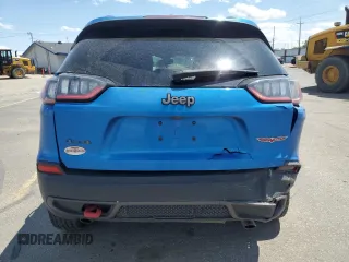 2021 Jeep Cherokee Trailhawk with VIN 1C4PJMBXXMD110436, listed as a Copart auction lot 57829375 with 46,647 mi miles and Salvage title. Bid and sale history available at DreamBid. Image 6.