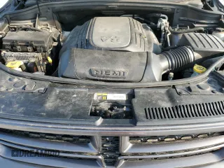 2015 Dodge Durango R/T z VIN 1C4SDJCT4FC710129, wystawiony jako Copart lot #59618075 z przebiegiem 159 577 mil mil oraz Szkoda całkowita • Salvage title. Historia ofert i sprzedaży dostępna na DreamBid. Obrazek 12.