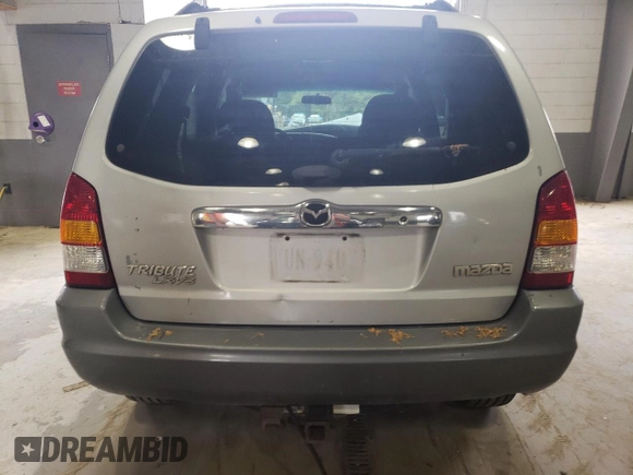 2001 Mazda Tribute LX with VIN 4F2CU08141KM65160, listed as a Copart auction lot 60895624 with 255,194 mi miles and Salvage Title. Bid and sale history available at DreamBid. Image 6.