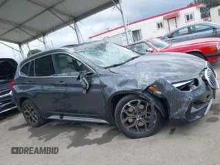 2021 BMW X1 xDrive28i with VIN WBXJG9C03M3M80011, listed as a IAAI auction lot 42137781 with 132,969 mi miles. Bid and sale history available at carsss.com. Image 13.