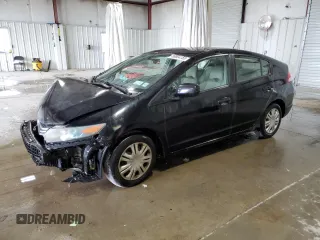 2010 Honda Insight LX z VIN JHMZE2H55AS014159, wystawiony jako Copart lot #56904155 z przebiegiem 124 821 mil mil oraz Nie do naprawy • Non repairable. Historia ofert i sprzedaży dostępna na DreamBid. Obrazek 1.