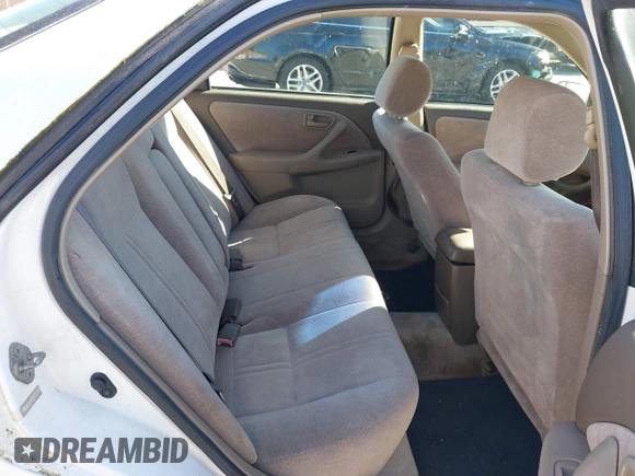 1998 Toyota Camry LE z VIN JT2BF22K9W0090879, wystawiony jako IAAI lot #41860538 z przebiegiem 248 879 mil mil oraz . Historia ofert i sprzedaży dostępna na DreamBid. Obrazek 8.