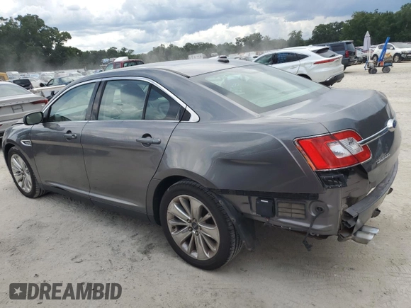 2011 Ford Taurus Limited with VIN 1FAHP2FW3BG184887, listed as a Copart auction lot 60717875 with 196,102 mi miles and Salvage title. Bid and sale history available at DreamBid. Image 2.
