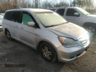 2006 Honda Odyssey EX-L with VIN 5FNRL38616B413712, listed as a IAAI auction lot 39878116 with 228,623 mi miles. Bid and sale history available at carsss.com. Image 1.