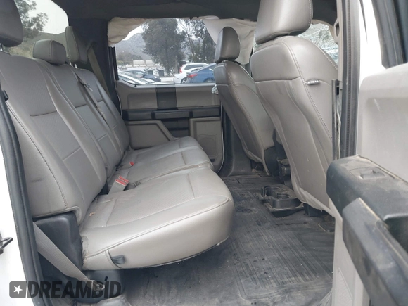 2019 Ford F-150 XL with VIN 1FTEW1CB3KKE51647, listed as a IAAI auction lot 42022111 with 59,344 mi miles and . Bid and sale history available at DreamBid. Image 8.