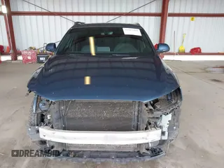 2016 Audi Q3 Prestige z VIN WA1GFCFS8GR020973, wystawiony jako IAAI lot #41923494 z przebiegiem 184 467 mil mil oraz . Historia ofert i sprzedaży dostępna na DreamBid. Obrazek 13.