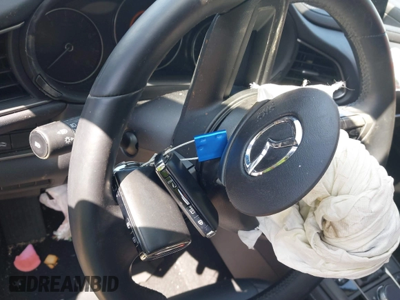 2022 Mazda CX-30 S Select z VIN 3MVDMBBL7NM413447, wystawiony jako IAAI lot #41772804 z przebiegiem 69 102 mil mil oraz . Historia ofert i sprzedaży dostępna na DreamBid. Obrazek 11.