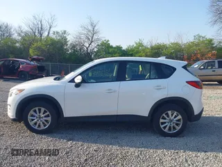 2016 Mazda CX-5 Sport with VIN JM3KE2BY2G0819604, listed as a IAAI auction lot 42059846 with 124,911 mi miles. Bid and sale history available at carsss.com. Image 14.