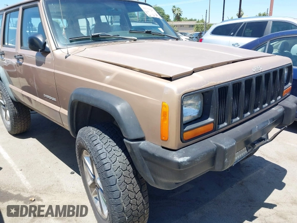1999 Jeep Cherokee SE with VIN 1J4FF28S4XL592788, listed as a IAAI auction lot 42560002 with 189,258 mi miles and . Bid and sale history available at DreamBid. Image 12.