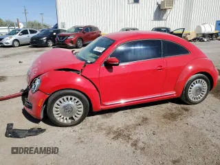 2014 Volkswagen Beetle 2.5L with VIN 3VWJX7AT9EM624916, listed as a Copart auction lot 71393474 with Not provided miles and Salvage title. Bid and sale history available at DreamBid. Image 1.