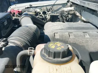 2013 Ford F-150 XL z VIN 1FTFW1CT3DFB23444, wystawiony jako IAAI lot #43152065 z przebiegiem 290 643 mil mil oraz . Historia ofert i sprzedaży dostępna na DreamBid. Obrazek 19.