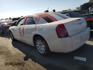 2008 Chrysler 300 LX with VIN 2C3KA43R18H230424, listed as a Copart auction lot 69319394 with 170,034 mi miles and Salvage Title. Bid and sale history available at carsss.com. Image 2.