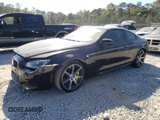2014 BMW M6 z VIN WBSLX9C56ED160249, wystawiony jako Copart lot #77395924 z przebiegiem 80 351 mil mil oraz Szkody całkowita. Historia ofert i sprzedaży dostępna na DreamBid. Obrazek 1.
