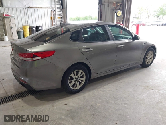 2016 Kia Optima LX with VIN 5XXGT4L33GG026183, listed as a IAAI auction lot 42156799 with 163,000 mi miles and . Bid and sale history available at carsss.com. Image 4.