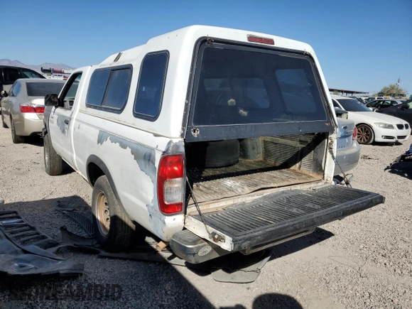 1998 Nissan Frontier XE with VIN 1N6DD21S9WC357098, listed as a Copart auction lot 77652604 with Not provided miles and Clean title. Bid and sale history available at DreamBid. Image 2.