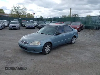 2000 Honda Civic VP with VIN 2HGEJ6614YH547366, listed as a IAAI auction lot 42059413 with 139,669 mi miles. Bid and sale history available at carsss.com. Image 2.