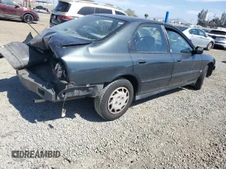 1994 Honda Accord DX with VIN 1HGCD5624RA099843, listed as a Copart auction lot 54045515 with 235,899 mi miles and Salvage Title. Bid and sale history available at carsss.com. Image 3.