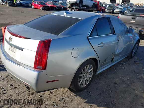 2010 Cadillac CTS Luxury with VIN 1G6DE5EG6A0111713, listed as a IAAI auction lot 41151719 with 138,277 mi miles and . Bid and sale history available at DreamBid. Image 4.