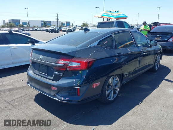 2018 Honda Clarity Touring with VIN JHMZC5F3XJC006383, listed as a IAAI auction lot 41996524 with 100,646 mi miles and . Bid and sale history available at DreamBid. Image 4.