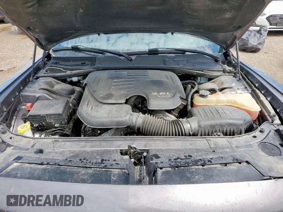 2016 Dodge Challenger SXT with VIN 2C3CDZAGXGH265147, listed as a Copart auction lot 59599185 with 83,671 mi miles and Salvage title. Bid and sale history available at DreamBid. Image 11.