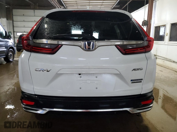 2021 Honda CR-V Touring z VIN 7FART6H97ME005163, wystawiony jako Copart lot #57688485 z przebiegiem 79 137 mil mil oraz Szkoda całkowita • Salvage title. Historia ofert i sprzedaży dostępna na DreamBid. Obrazek 6.