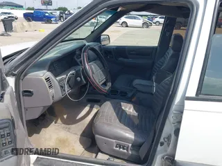 1994 Jeep Grand Cherokee Laredo with VIN 1J4FX58SXRC120936, listed as a IAAI auction lot 42530212 with 126,367 mi miles and . Bid and sale history available at DreamBid. Image 5.