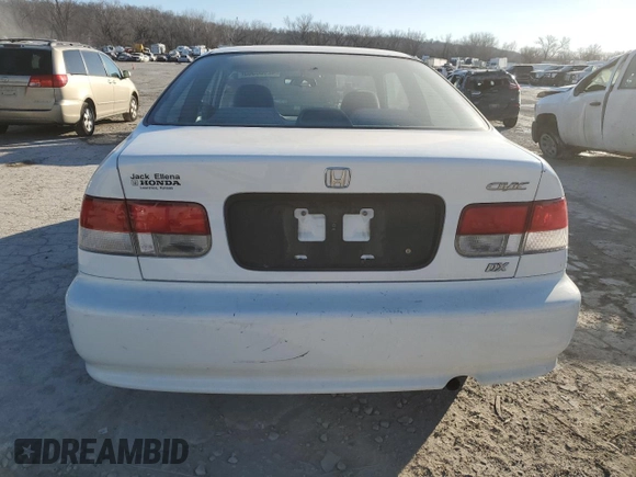 1999 Honda Civic DX with VIN 1HGEJ6120XL031958, listed as a Copart auction lot 42166565 with 69,457 mi miles and Clean Title. Bid and sale history available at carsss.com. Image 6.