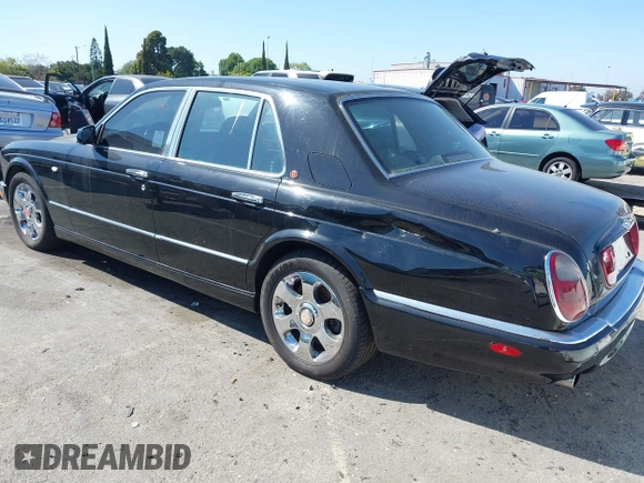 2001 Bentley Arnage with VIN SCBLC31E11CX06297, listed as a IAAI auction lot 41980275 with 63,510 mi miles and . Bid and sale history available at DreamBid. Image 3.