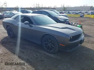 2019 Dodge Challenger SXT z VIN 2C3CDZAG2KH612656, wystawiony jako IAAI lot #41900959 z przebiegiem 74 424 mil mil oraz . Historia ofert i sprzedaży dostępna na DreamBid. Obrazek 1.