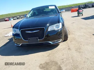 2019 Chrysler 300 Limited with VIN 2C3CCAKG8KH610865, listed as a IAAI auction lot 41668294 with 121,656 mi miles. Bid and sale history available at carsss.com. Image 12.