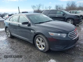 2013 Ford Taurus SEL with VIN 1FAHP2E86DG135835, listed as a IAAI auction lot 41665430 with 130,816 mi miles. Bid and sale history available at carsss.com. Image 1.