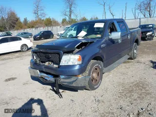 2004 Ford F-150 XLT with VIN 1FTRW12W44KD01717, listed as a IAAI auction lot 41252201 with 118,157 mi miles. Bid and sale history available at carsss.com. Image 2.