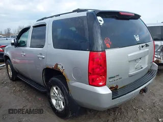 2010 GMC Yukon SLT with VIN 1GKUKCE0XAR286060, listed as a IAAI auction lot 41900285 with 307,912 mi miles. Bid and sale history available at carsss.com. Image 3.
