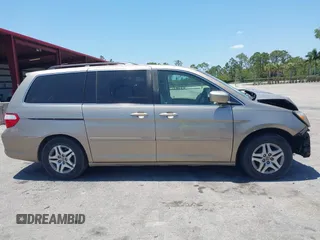 2005 Honda Odyssey EX with VIN 5FNRL38495B401742, listed as a IAAI auction lot 42133434 with 162,161 mi miles and . Bid and sale history available at carsss.com. Image 14.