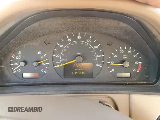 2000 Mercedes-Benz E-Class with VIN WDBJH65J4YB071699, listed as a Copart auction lot 75082144 with 105,989 mi miles and Salvage Title. Bid and sale history available at carsss.com. Image 9.