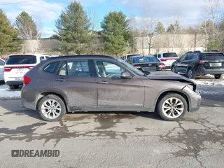 2014 BMW X1 xDrive28i with VIN WBAVL1C56EVY19340, listed as a IAAI auction lot 41340436 with 85,867 mi miles. Bid and sale history available at carsss.com. Image 13.