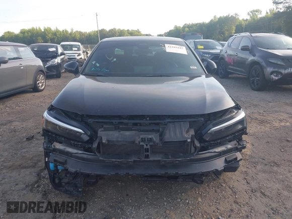 2022 Honda Civic Sport z VIN 2HGFE2F51NH570426, wystawiony jako IAAI lot #42289187 z przebiegiem 79 995 mil mil oraz . Historia ofert i sprzedaży dostępna na DreamBid. Obrazek 12.