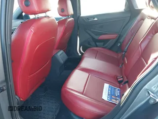 2023 Volkswagen Jetta Sport z VIN 3VWBM7BU5PM035014, wystawiony jako IAAI lot #41818798 z przebiegiem 21 202 mil mil oraz . Historia ofert i sprzedaży dostępna na DreamBid. Obrazek 8.