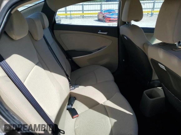 2014 Hyundai Accent GLS z VIN KMHCT4AEXEU680071, wystawiony jako Copart lot #50253905 z przebiegiem 84 454 mil mil oraz Szkoda całkowita • Salvage title. Historia ofert i sprzedaży dostępna na DreamBid. Obrazek 10.
