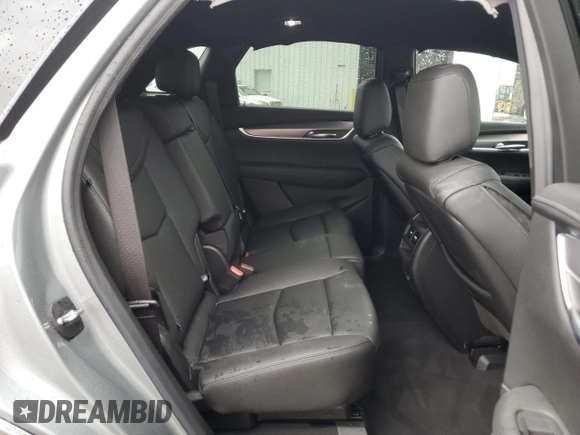 2023 Cadillac XT5 FWD Luxury z VIN 1GYKNAR47PZ144988, wystawiony jako Copart lot #50830365 z przebiegiem 17 687 mil mil oraz Szkoda całkowita • Salvage title. Historia ofert i sprzedaży dostępna na DreamBid. Obrazek 11.