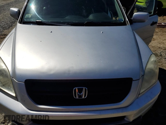 2005 Honda Pilot EX-L z VIN 5FNYF18595B055806, wystawiony jako Copart lot #52372625 z przebiegiem 180 886 mil mil oraz Czysty tytuł • Clean title. Historia ofert i sprzedaży dostępna na DreamBid. Obrazek 12.