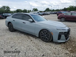 2023 BMW 7 Series 740i with VIN WBA23EH0XPCM01840, listed as a Copart auction lot 58458355 with Not provided miles and Salvage title. Bid and sale history available at DreamBid. Image 4.