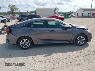 2017 Honda Civic LX with VIN 19XFC2F51HE036153, listed as a IAAI auction lot 41546498 with 78,726 mi miles and . Bid and sale history available at DreamBid. Image 18.