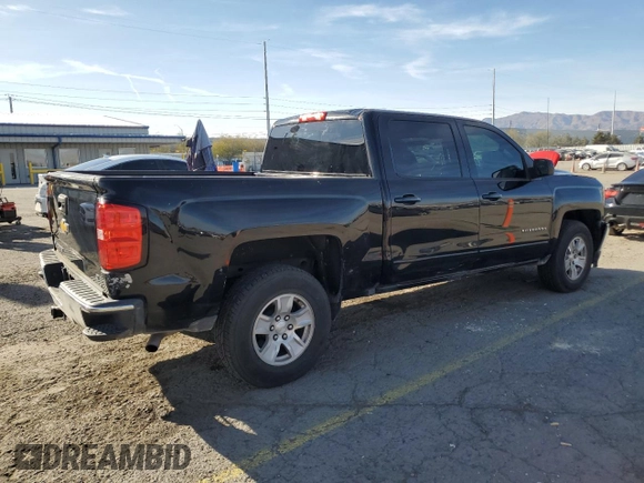 2018 Chevrolet Silverado 1500 LT with VIN 3GCPCREC1JG412907, listed as a Copart auction lot 51138915 with 72,063 mi miles and Salvage Title. Bid and sale history available at DreamBid. Image 3.